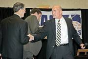 Kansas Atty. Gen. Phill Kline, left, and Democratic challenger Paul Morrison didn't have many positive things to say about each other during a debate Tuesday at Harrah's Prairie Band Casino Hotel near Mayetta.