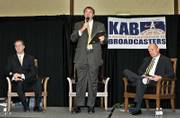 A campaign mailing sent recently to registered voters in Topeka and Lawrence contains incorrect information about the state's murder rate. The mailing claims violent crimes have skyrocketed during Atty. Gen. Phill Kline's investigation of abortion records, but the 2002 statistics were incorrect. Kline, left, and opponent Paul Morrison met Tuesday in a debate in Mayetta. At center is Washburn University political science professor Bob Beatty. Morrison's campaign manager said the Democrat and his staff didn't have prior knowledge of the mailing.