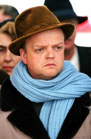 Truman Capote (Toby Jones) spends six years investigating the murders of a Kansas farm family for his true-crime novel, "In Cold Blood," in the biopic "Infamous."