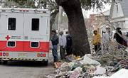 People line up for food provided by the American Red Cross in the Lakeshore neighborhood of New Orleans in a December file photo. Sparked by criticism of its response to Hurricane Katrina, the American Red Cross released plans Monday for sweeping changes in its governance structure, such as reducing its 50-member board by more than half.