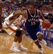 After an impressive freshman year, Mario Chalmers (15) shared the Jayhawks' most improved player award with Julian Wright.