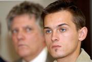 Kyle Snyder, 23, right, a soldier who fled to Canada rather than return to Iraq, disappeared last week after being ordered to return to his unit. His case worries other AWOL soldiers who would like to return to the U.S. At left is his attorney, James Fennerty.