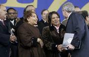 President Bush stops to shake hands with, from left, Martin Luther King III, Yolanda Denise King and Bernice Albertine King, children of civil rights leader Martin Luther King Jr. Bush spoke Monday at the groundbreaking ceremony for the Martin Luther King Jr. National Memorial on the National Mall in Washington, D.C.