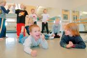 AIDAN CHAIR, 5, left, and Sterling Hollond, 5, are among children who will perform in "The Snow Queen" at the Lawrence Arts Center next month. They rehearsed their scenes Nov. 5 at the arts center.