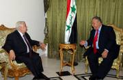 Syria's Foreign Minister Walid Moallem, left, meets with Iraqi President Jalal Talabani in Baghdad, Iraq. Talabani met privately Monday with Moallem. The Iraqi government said diplomatic relations between the two countries - severed nearly a quarter-century ago - were being restored.
