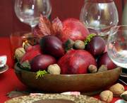 An edible centerpiece of pomegranates, tamarillos and mixed nuts created by Matthew Mead of Matthew Mead Productions in Boscawen, N.H., makes use of exotic and unexpected fruit.