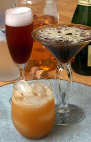 A variety of seasonally appropriate drinks will add to the food selection during the holiday season. At back left is Pomegranate-cherry Royale, foreground, Apple Orchard, and right, Vodka Espresso.