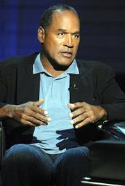 O.J. Simpson is shown during an exclusive interview with publisher Judith Regan (not pictured) about how the murders of Nicole Brown Simpson and Ron Goldman would have taken place had he actually committed the crimes. Simpson said Wednesday that he agreed to a book and television interview because he needed the money.