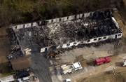 An aerial view shows what is left of the Anderson Guest House where 10 residents died and at least two dozen were injured in an early morning fire in Anderson, Mo., Monday, Nov. 27, 2006.