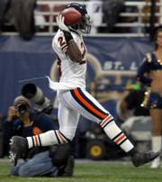 Chicago's Devin Hester celebrates his first of two kickoff returns for touchdowns. It was Hester's fifth return for a touchdown of the season, and he added his sixth in the fourth quarter of Chicago's 42-27 victory Monday in St. Louis.