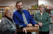 Three longtime Lawrence school district administrators who represent 103 years of service plan to retire at the end of the academic year. From left are Sandee Crowther, executive director of planning and program improvement, Tom Christie, executive director of educational programming, and Janice Nicklaus, executive director of educational programming-instruction.