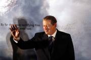 Al Gore waves during the premiere of the documentary "An Inconvenient Truth" on Sept. 12 in Hong Kong. The former vice president has crisscrossed the globe and the nation to promote the DVD version of his film, and in recent weeks has made high-profile television appearances while insisting he's not planning a return to politics. But, he adds, he hasn't completely ruled it out.