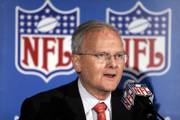 Kansas City Chiefs owner Lamar Hunt talks to the media after Kansas City, Mo., was announced as a Super Bowl site in this file photo from Nov. 15, 2005. Hunt died Wednesday night.
