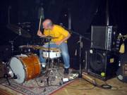 Craig Comstock showcases his unique setup of drums, guitar, tape loops and vocals during a live show of his act This is My Condition.