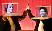 YouTube co-founders Chad Hurley, left, and Steven Chen, hold up their laptops at their office loft in San Mateo, Calif. Hurley is CEO of the Web site Google recently bought for $1.65 billion, and which was dubbed by Time magazine as invention of the year.