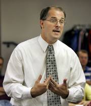 Attorney Gen-eral phill kline talks to a men's group Sept. 16 at Topeka Bible Church. Gov. Kathleen Sebelius won't sign off on Kline's appointment as Johnson County district attorney, an unprecedented move that won't stop his appointment.