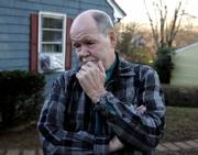Dave Wuterich, father of U.S. Marine Corps Staff Sgt. Frank Wuterich, meets with reporters outside his home in Meriden, Conn. He said Thursday that the family is having a hard time with the charges lodged against Frank Wuterich in connection with the deaths of 24 Iraqi civilians in 2005 in Haditha, Iraq.