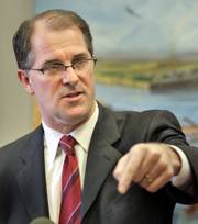 Kansas Attorney General Phill Kline answers a question during a news conference Friday, Dec. 23, 2006, at his office in Topeka.