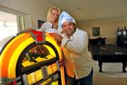 Andy Rudnick, 42, creator of the Matzo Ball, poses with his wife, Catherine, 33, at their residence Saturday in Boca Raton, Fla. Rudnick was just out of college when he threw the first Matzo Ball party in Boston in 1987. To Rudnick's surprise, 2,000 people showed up for the event, named after the dumpling-like Jewish food.