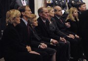 Betty Ford sits with her children and their spouses Monday as they view the casket of her husband, President Gerald Ford, in the Rotunda of the U.S. Capitol in Washington. From left are Gayle and Michael Ford, Betty Ford, Steven Ford, Susan Ford Bales and her husband, Vaden Bales, and Juliann and Jack Ford.