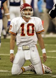 Kansas city quarterback trent green kneels on the turf after getting hit and fumbling late in the game. The Colts defeated the Chiefs, 23-8, Saturday in Indianapolis. Green was sacked four times and threw two interceptions, and Kansas City didn't earn a first down until the final minutes of the third quarter.