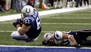 Indianapolis defensive tackle dan klecko (61) scores on a one-yard touchdown reception from Peyton Manning.