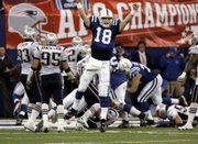 Indianapolis quarterback Peyton Manning celebrates Joseph Addai's go-ahead touchdown run. The Colts defeated the Patriots, 38-34, Sunday in Indianapolis.