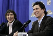 The Washington CAPITALS' Alex Ovechkin, RIGHT, and the PITTSBURGH PENGUINS' SIDNEY CROSBY speak during media availability as part of the NHL All-Star Game festivities. The two young stars will play in tonight's All-Star Game in Dallas.
