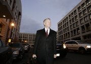 I. Lewis "Scooter" Libby, former chief of staff for Vice President Dick Cheney, walks to a waiting cab as he leaves U.S. Federal Court on Tuesday in Washington.