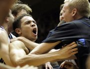 Duke's David McClure, center, celebrates his game-winning shot against Clemson. Duke won, 68-66, on Thursday night in Durham, N.C.