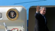 President Bush flew to Kansas City, Mo., to push his proposal to expand access to health insurance. In his State of the Union address Tuesday, Bush proposed taxing employer-financed health care benefits after a deduction of $15,000 for families and $7,500 for individuals.