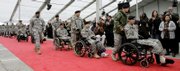 Wounded soldiers arrive for the official dedication of the Center for the Intrepid, a $50 million high-tech rehabilitation center designed to serve the growing number of soldiers who return from war as amputees or with severe burns. The center opened Monday in San Antonio.