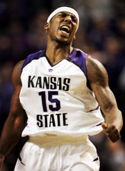 Kansas state forward david hoskins celebrates a basket during the first half against Missouri. K-State beat Missouri, 80-73, Wednesday in Manhattan to improve to 5-2 in the Big 12 Conference.