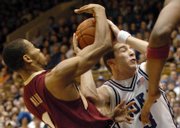 Florida State's Jerel Allen, left, steals the ball from Duke's Greg Paulus (3) in the first half of Sunday's basketball game. FSU upset Duke, 68-67, Sunday in Durham, N.C.