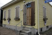 Shutters on the home of Jennifer Johansen are closed and stay that way for security reasons in New Orleans. Johansen's house is for sale, and the nurse, who returned to the city after Hurricane Katrina, hopes to move to Seattle soon.