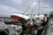 Boats remained piled up following Hurricane Katrina at the Municipal Yacht Harbor in New Orleans. A compromised quality of life and uncertainty about New Orleans' future after Hurricane Katrina have the city on edge, threatening to push younger, more educated residents away and exclude poor people from the recovery. It is almost 18 months since Hurricane Katrina flooded the city.