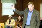 Price Banks, a Lawrence land-use attorney, talks Sunday at a Tonganoxie meeting in which area residents gathered to to discuss the proposed turnpike interchange on County Road 1 south of Tonganoxie. Also pictured are Kerry Holton, left, and Jan Bernhardt, Tonganoxie-area residents who have expressed opposition to the turnpike interchange.