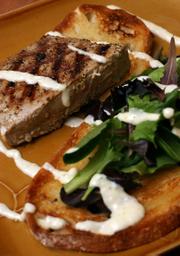 A deconstructed tuna sandwich will give diners all the tastes associated with a tuna sandwich, but is presented in a way that will allow them to appreciate each ingredient.