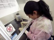 Sueraja Narasimhan works with DNA samples at the Centers for Disease Control and Prevention's chronic fatigue syndrome lab in Atlanta in this December file photo. A public awareness campaign of chronic fatigue syndrome started after an investigation exposed the CDC's misuse of chronic fatigue funding.