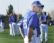 KANSAS CITY ROYALS MANAGER BUDDY BELL watches over practice in Surprise, Ariz. Bell said Wednesday he likes the chemistry of his ballclub as it embarks on the 2007 season.