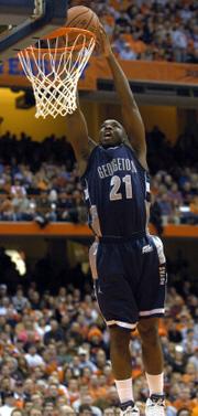 Georgetown's Jesse Sapp dunks after a steal against Syracuse. The Hoyas fell to the Orange in Syracuse, N.Y., after moving up to No. 9 in the AP poll earlier Monday.