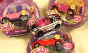 In a shift from its Matchbox racers geared toward boys, Mattel's Polly Wheels come with tiny removable Polly Pocket dolls and frosted plastic covering the metal chassis.