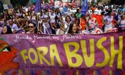 Activists carry a banner that reads "Get out Bush" during a protest march Thursday against President Bush in Sao Paulo, Brazil. Bush is on a five-country Latin American visit.