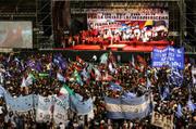 Thousands attend a rally against the ongoing visit to several Latin American countries by President Bush on Friday at the Ferrocarril Oeste stadium in Buenos Aires, Argentina. The demonstration was attended by Venezuela's President Hugo Chavez.