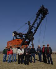Former coal miners who worked on Big Brutus gather in front of the 16-story (160-feet tall), 11 million pounds electric shovel near West Mineral, Ks. It cost $6.5 million in 1962 and operated in southeast Kansas from 1963 to 1974.