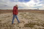 Mickey Center, an environmental scientist with the Kansas Department of Health and Environment's Surface Mining Section, walks through what locals refer to as "Hell's Half Acre." The land, located just east of Galena's downtown, is literally sinking and is deemed too risky to redevelop.
