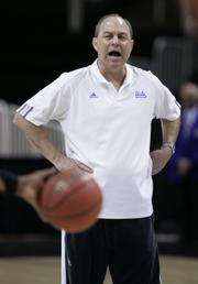 UCLA coach Ben Howland oversees his team's practices Wednesday in San Jose, Calif. Howland is longtime friends with Pittsburgh coach Jamie Dixon. The two coaches will face each other in a West Regional semifinal tonight.