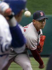 BOSTON's DAISUKE MATSUZAKA throws to Kansas City's Tony Pena Jr. Matsuzaka threw seven strong innings Thursday in a 4-1 victory at Kauffman Stadium.