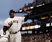 Barry Bonds acknowledges the crowd after hitting his 735th career home run Wednesday night in San Francisco.