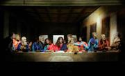 Members of a Catholic theater group perform a scene depicting Leonardo da Vinci&squot;s "The Last Supper" during the Good Friday traditional celebrations Friday in San Ignacio, Paraguay. Some 11,000 candles were lit for a procession and members of a local theater group performed depictions of famous artists&squot; paintings of religious scenes.